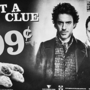 Black and white image from an advertisement for Go Go Taquitos featuring Robert Downey Jr and Jude Law from the movie Sherlock Holmes.