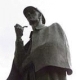 Black and white photo of the Sherlock Holmes statue in London.